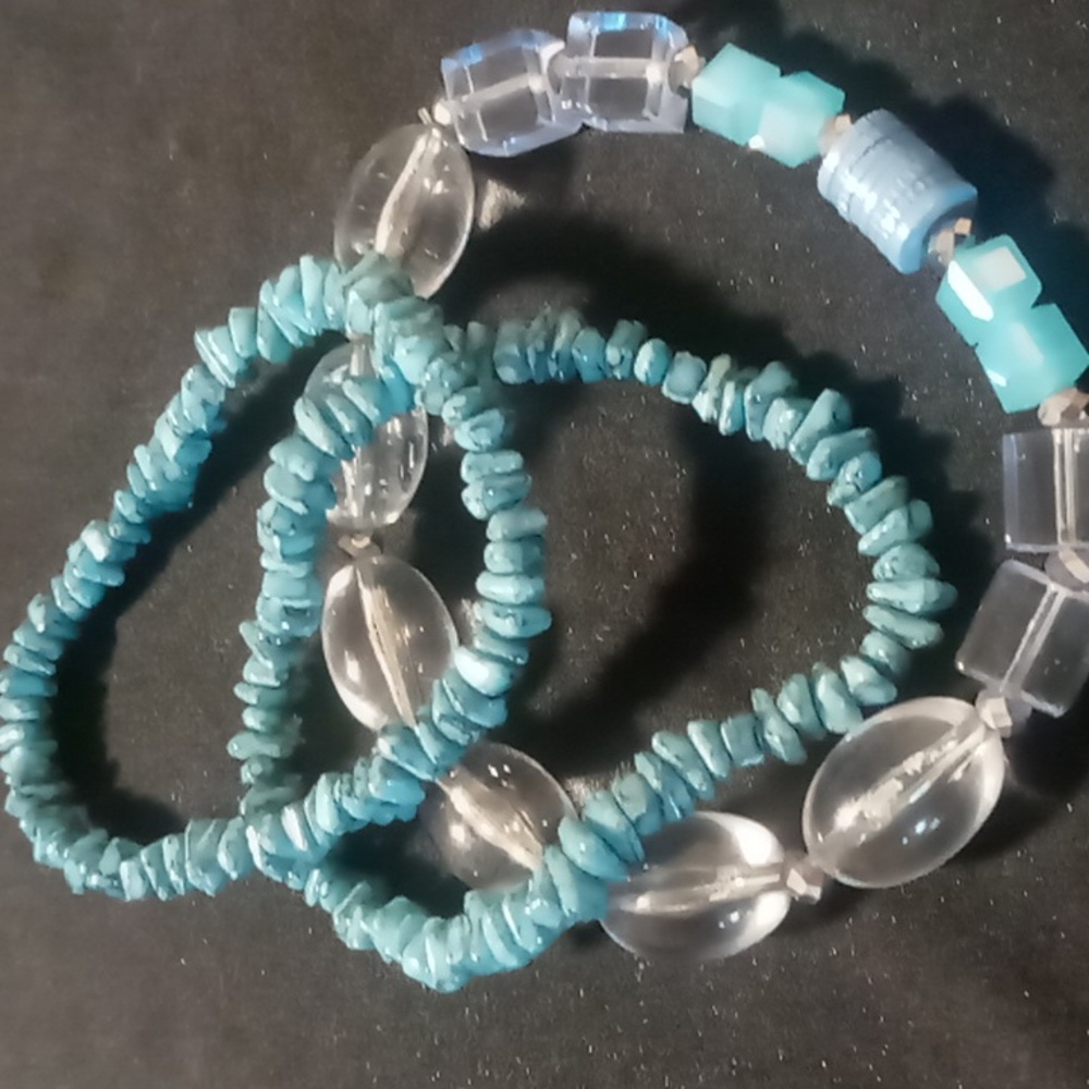 expandable bracelets 3 shells and resin beaded crystal cut.